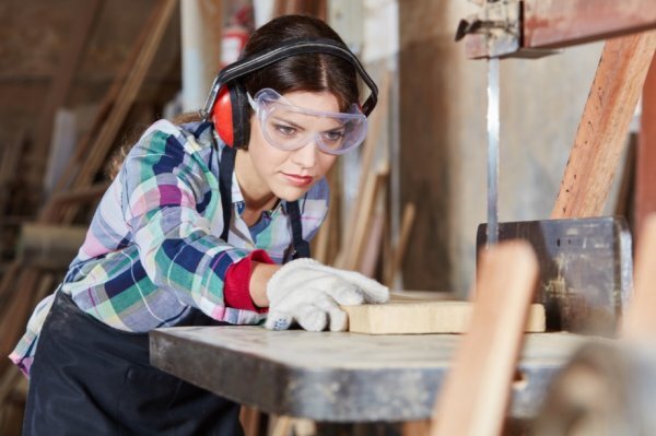 Person cutting wood